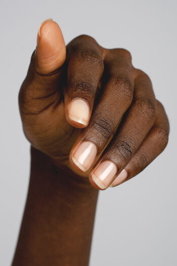 base coat Nail Polish hand swatch on dark skin tone by sienna