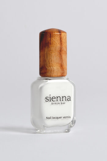 white nail polish bottle with timber cap by sienna