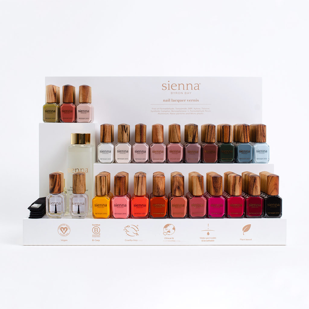 sienna large white display stand with autumn colours on white background